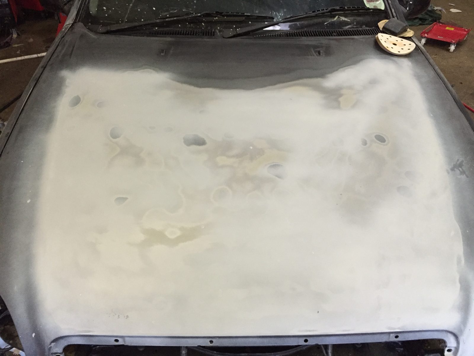 The bonnet in grey primer