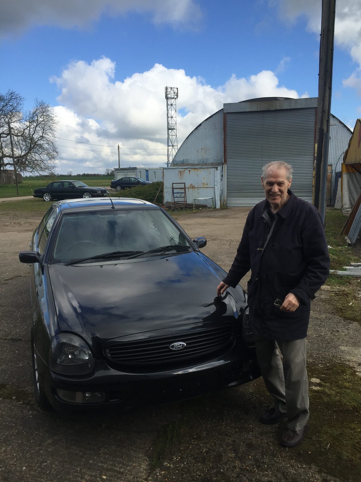 Mike's dad standing beside the black Ford Granada Scorpio